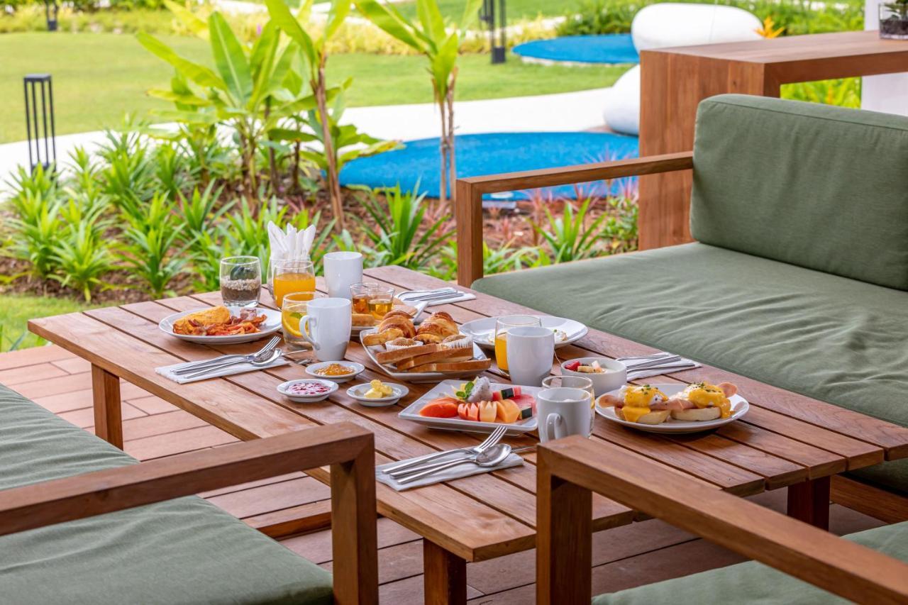 Outrigger Khao Lak Beach Resort - Sha Extra Plus Exteriér fotografie A breakfast table